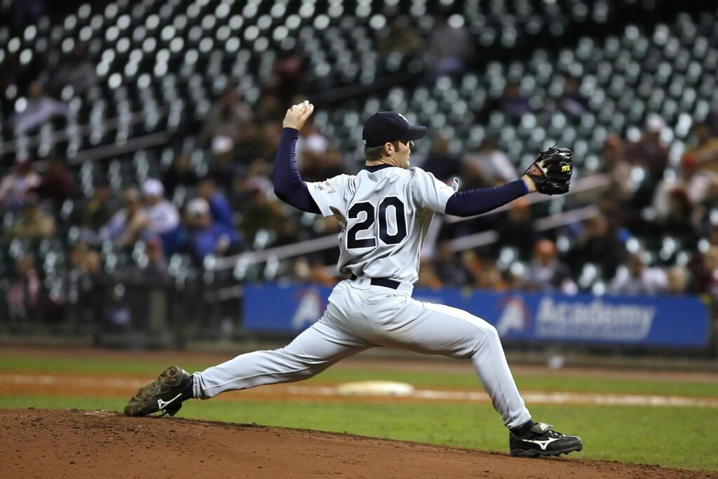 baseball-player-pitcher-ball-163487-163487 Baseball player pitching on field during a game, showcasing athletic action and focus.