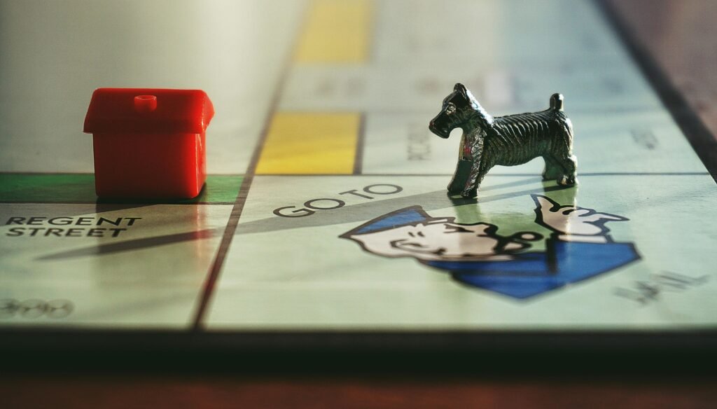 pexels-photo-1314435-1314435 Detailed view of a Monopoly board with tokens on Regent Street.