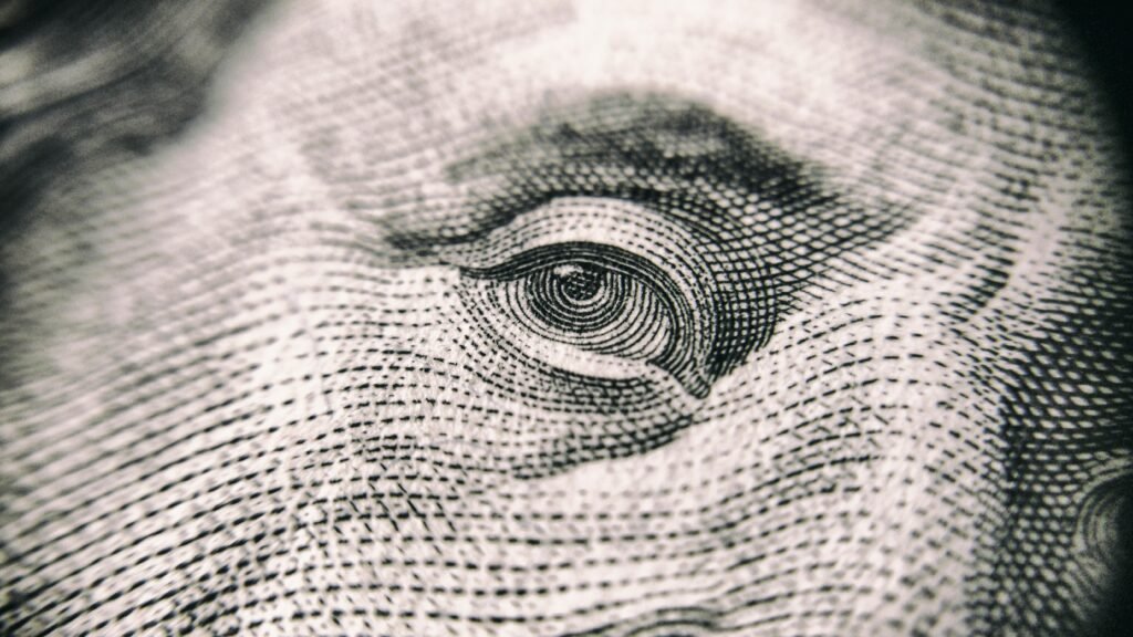 pexels-photo-251287-251287 Detailed close-up of a banknote's eye, showcasing its intricate texture and design.