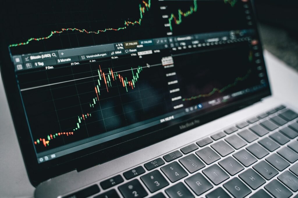 pexels-photo-6770609-6770609 Close-up of a financial graph on a laptop screen, depicting stock market analysis in Berlin.