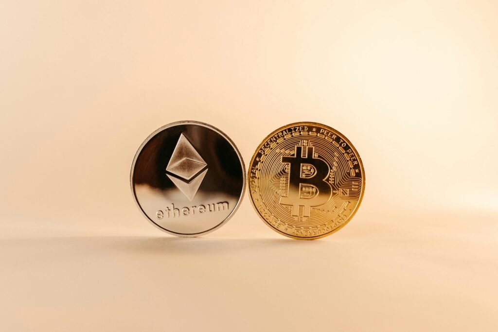 Close-up of Bitcoin and Ethereum coins symbolizing digital currency and blockchain technology.